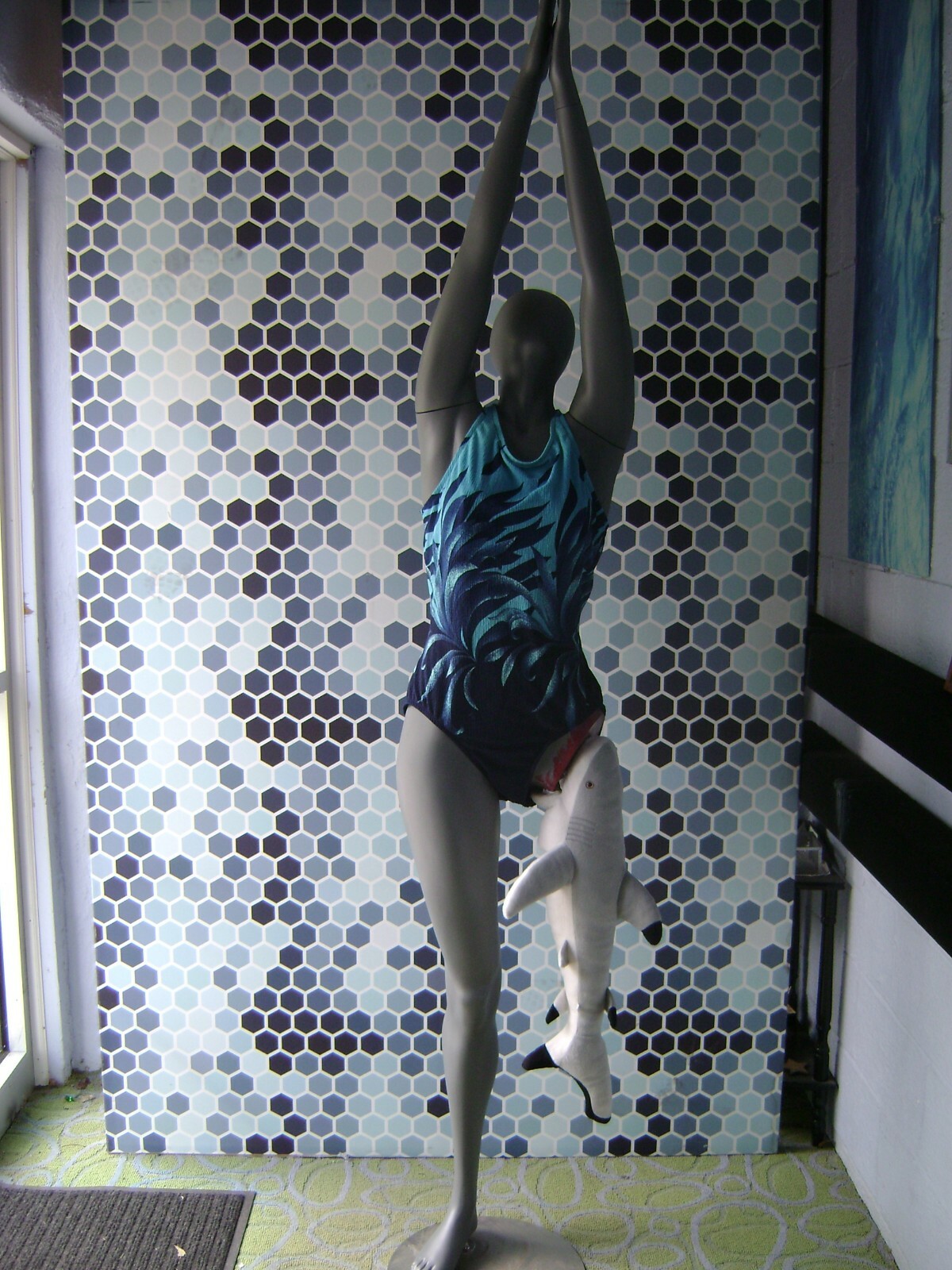 GRAY MANNEQUIN FEMALE POSED W/ BEACH SHARK LEG