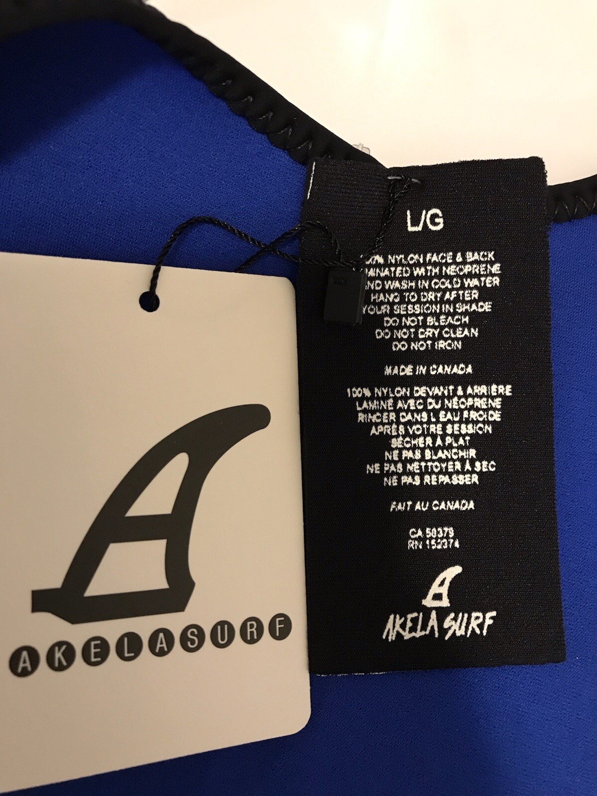 Akela Surf Womens Reversible Black/Blue Neoprene Bikini Top Size Large NWT