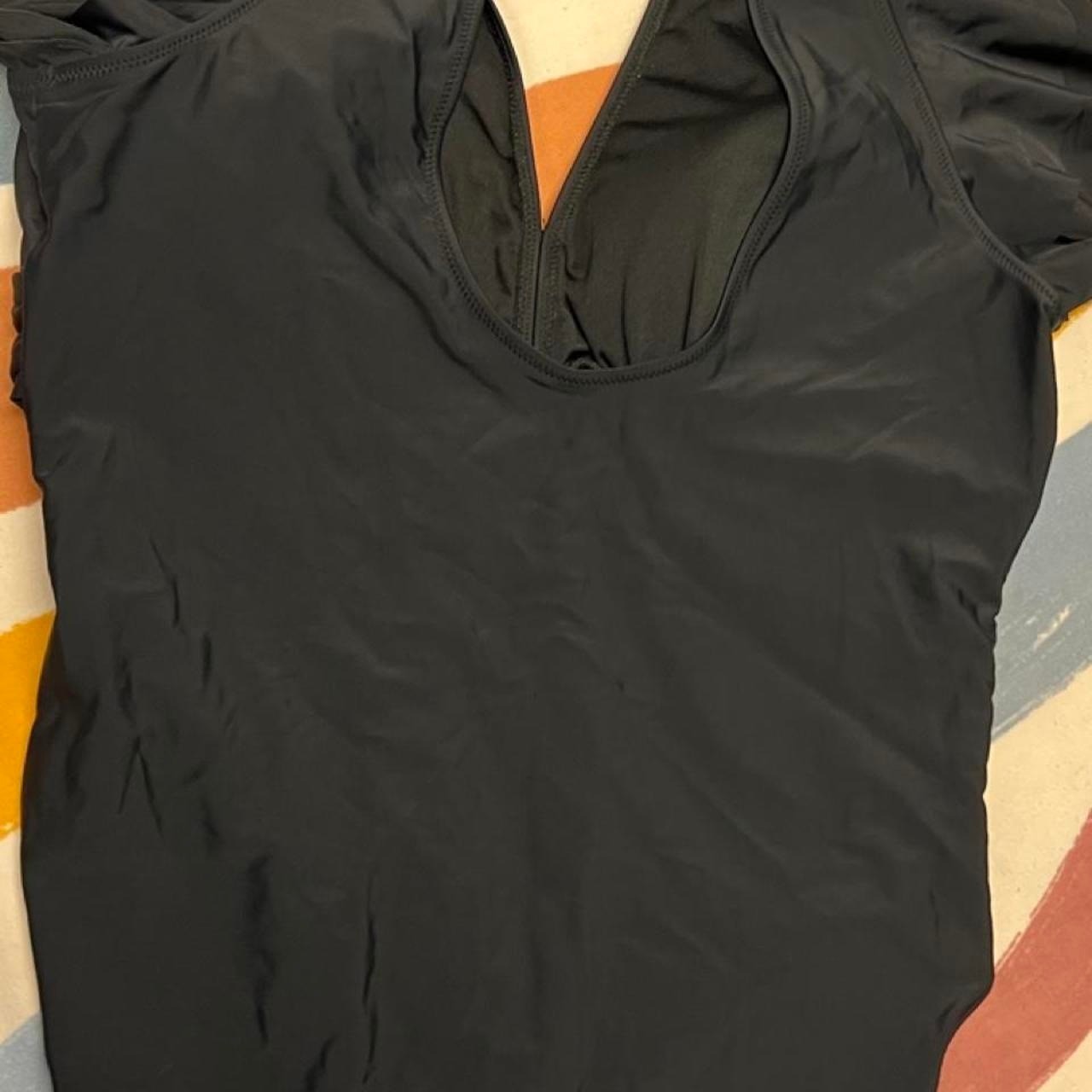 Black one piece swimsuit with ruched sides and tie front detail in size 3XL 50.2