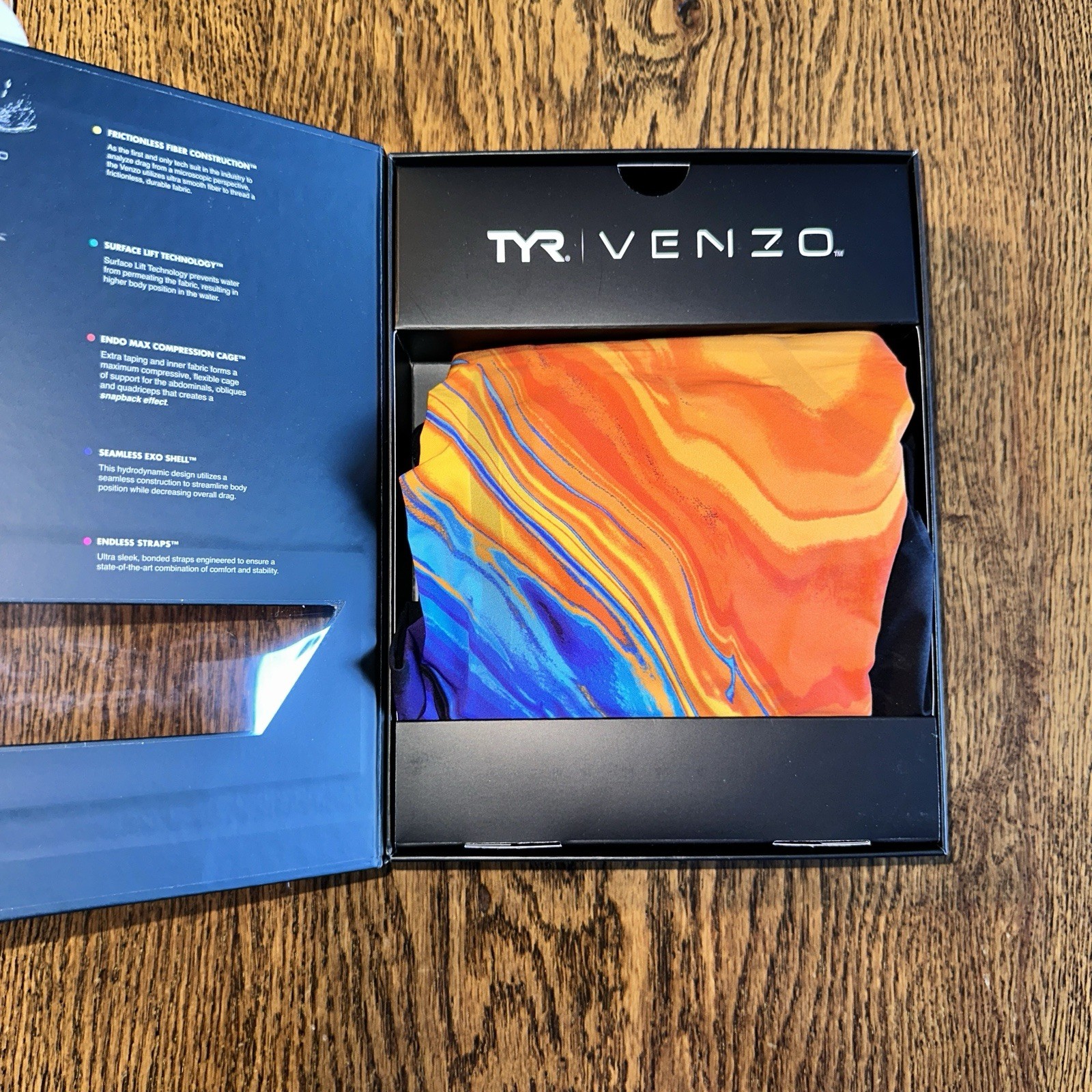 TYR Women’s Venzo Volconyx Open Back Tech Suit Size 28 NWT Orange Blue Black