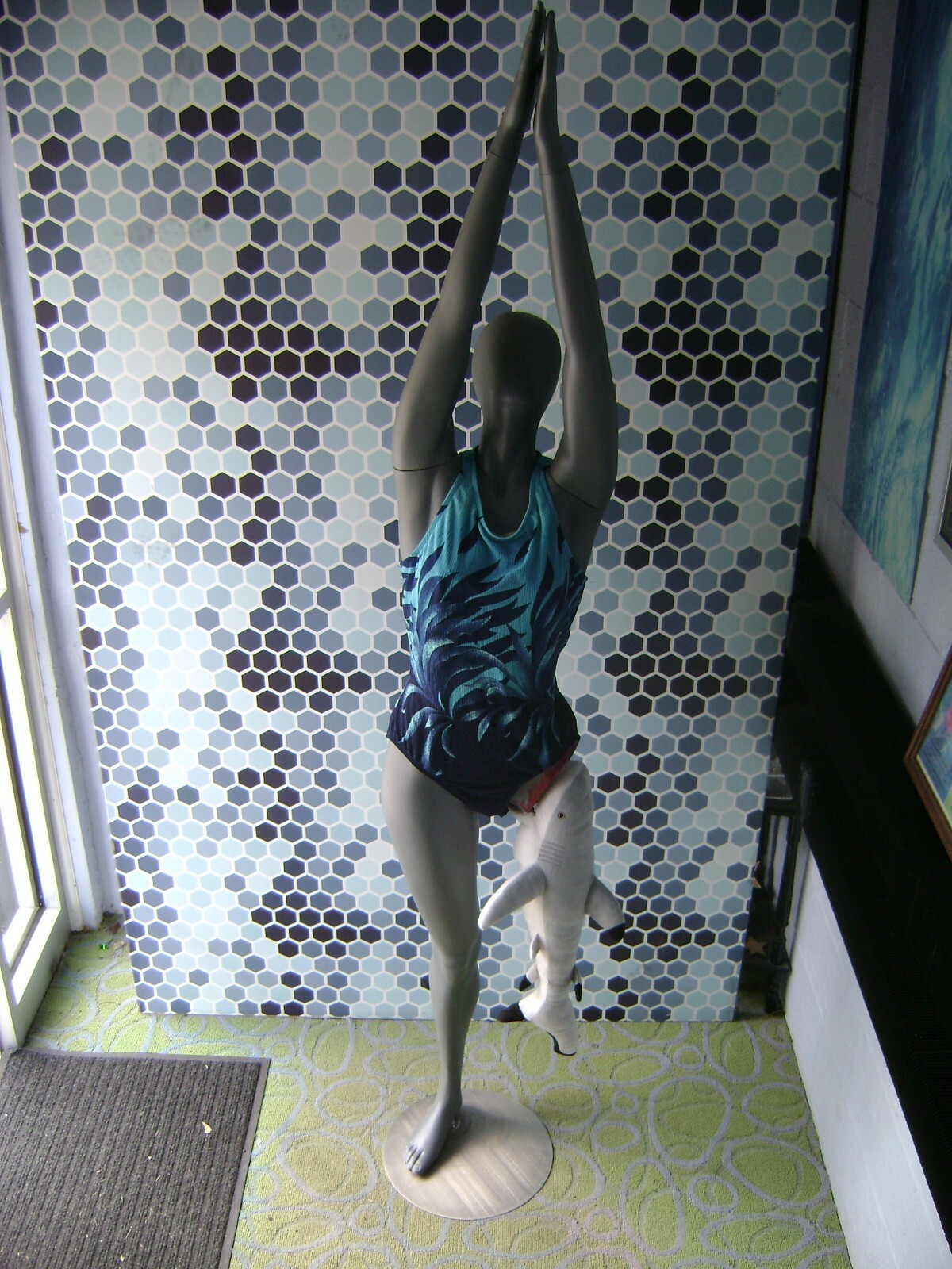 GRAY MANNEQUIN FEMALE POSED W/ BEACH SHARK LEG